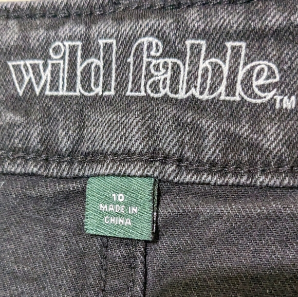 Distressed black acid wash denim mini skirt in size 10 - Picture 8 of 9